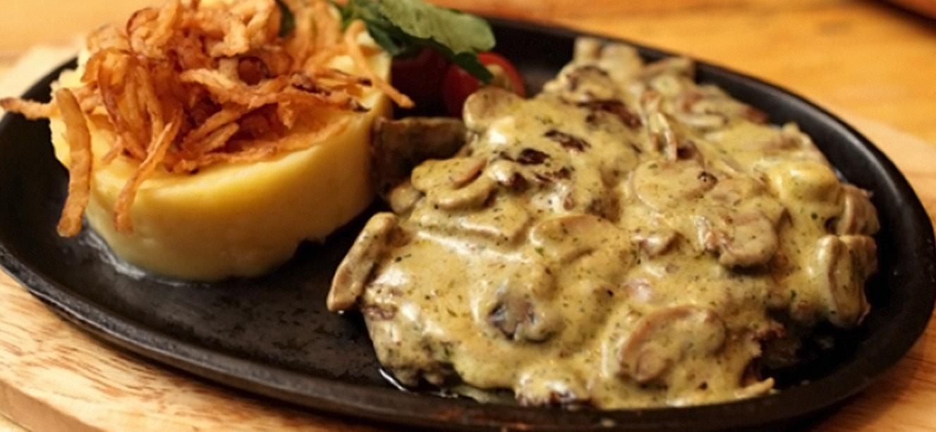 Lomo de cerdo en salsa de queso