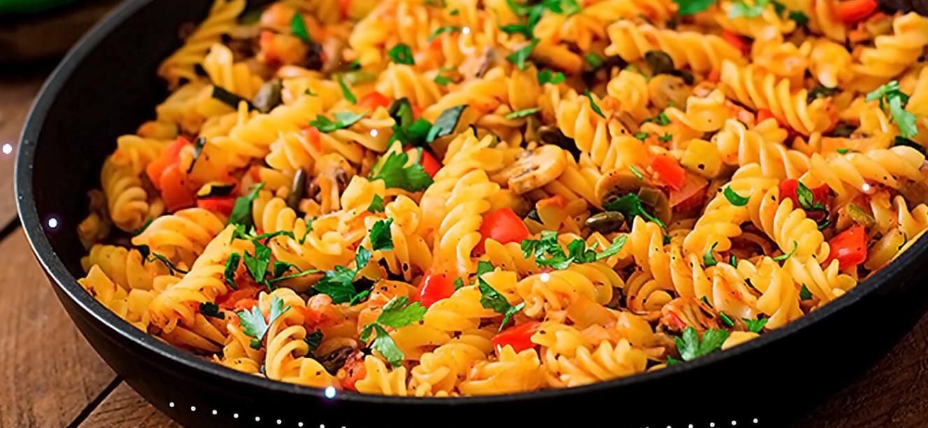 Pasta corta con arvejas, crema y maíz